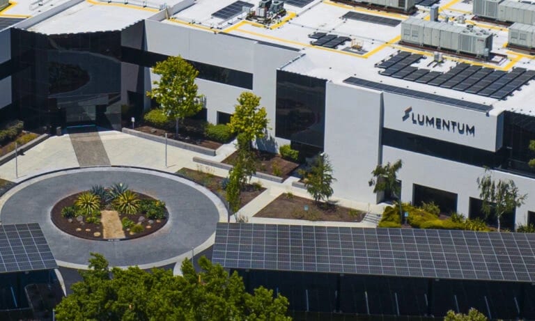 Lumentum Surges Nearly 10% as Corning Stagnates: AI Optics Divergence?